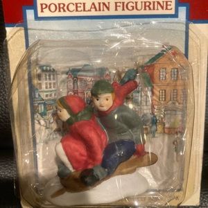 Lemax retired boy and girl on sled nwt